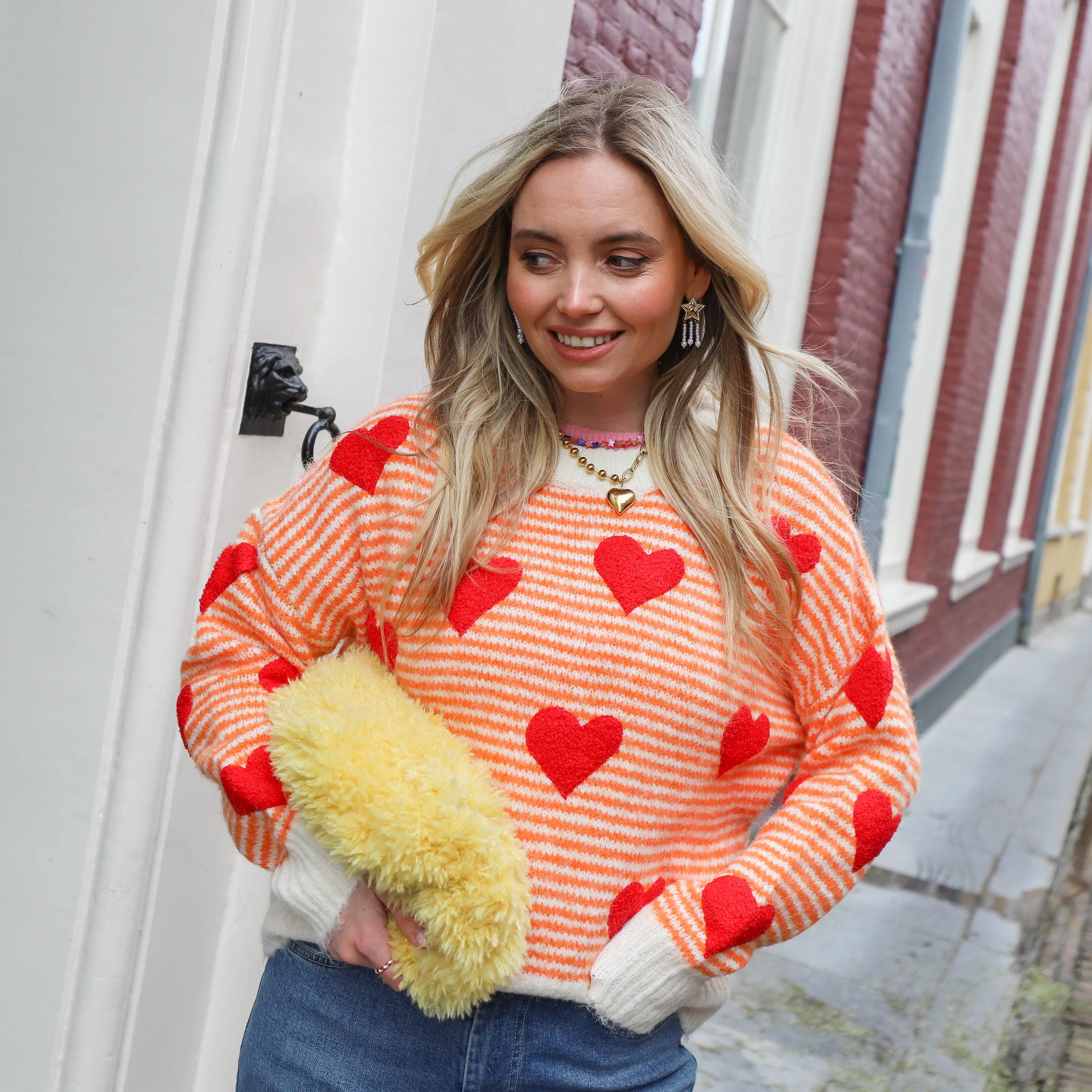 Hartjes streep trui oranje