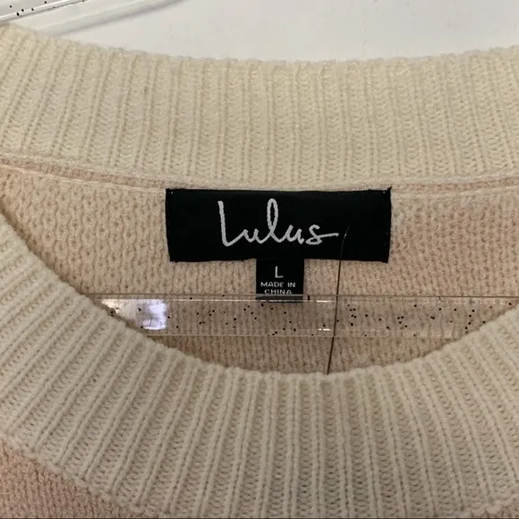 New Lulus Your new favorite Zebra print and cream knit sweater Large