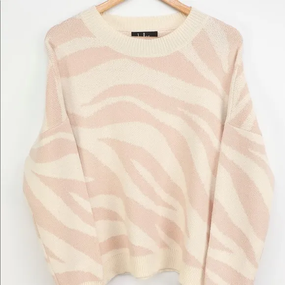 New Lulus Your new favorite Zebra print and cream knit sweater Large