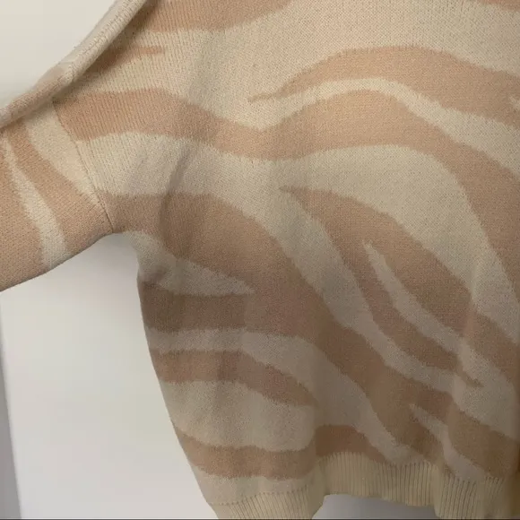 New Lulus Your new favorite Zebra print and cream knit sweater Large