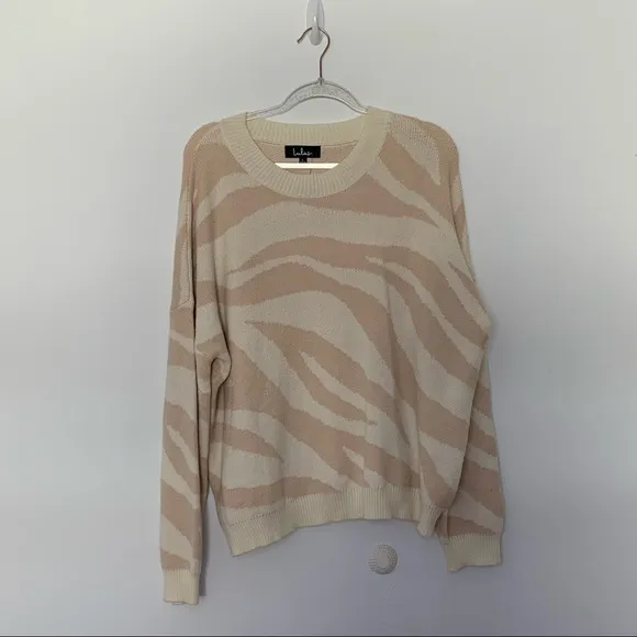 New Lulus Your new favorite Zebra print and cream knit sweater Large