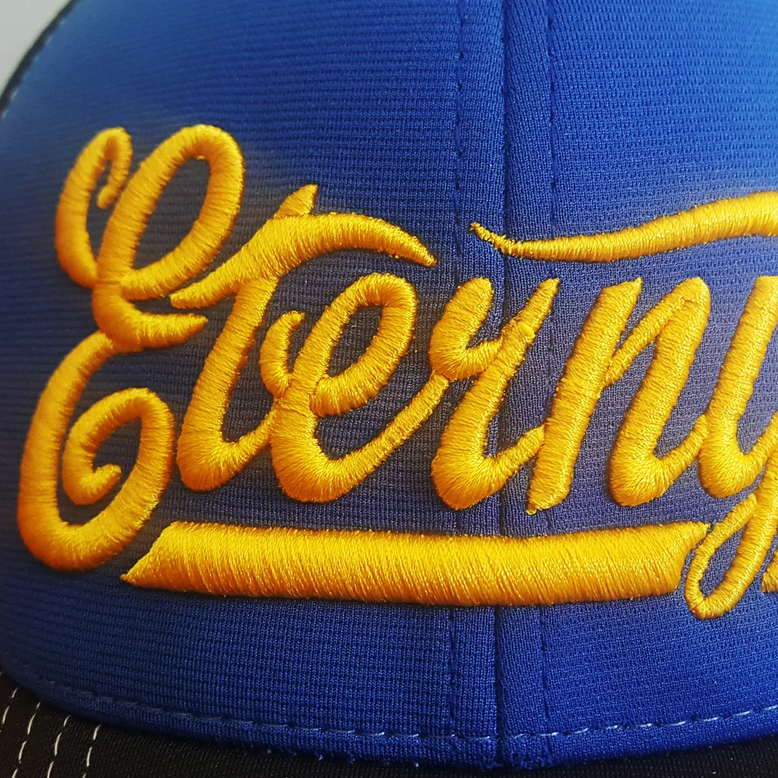 Scripty Brew Puff Fitted Blue Trucker Cap