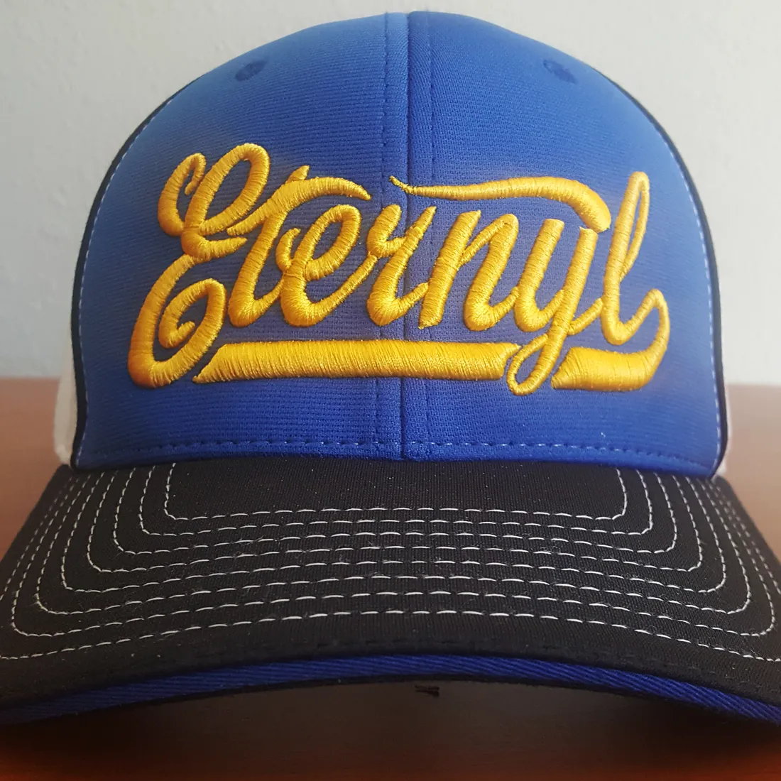 Scripty Brew Puff Fitted Blue Trucker Cap