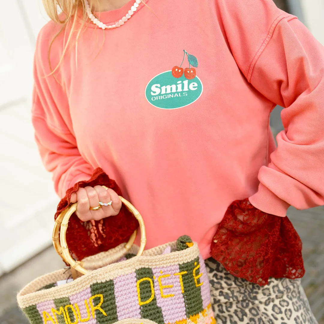 Smile sweater roze