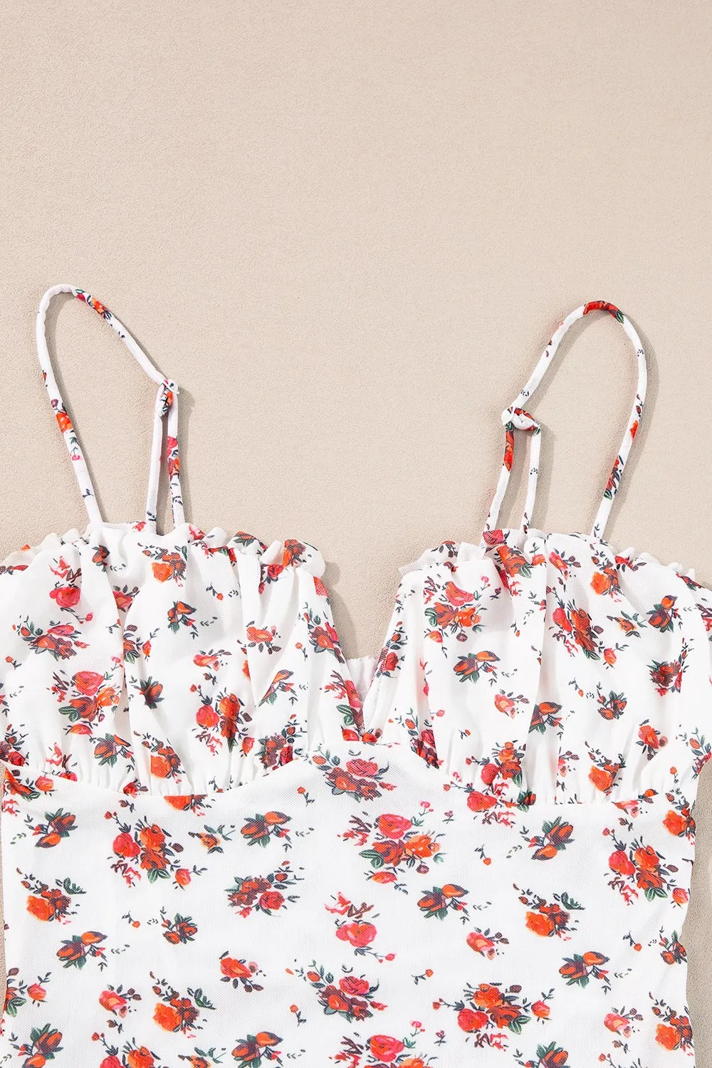 The Foxy Frill Floral Bodysuit