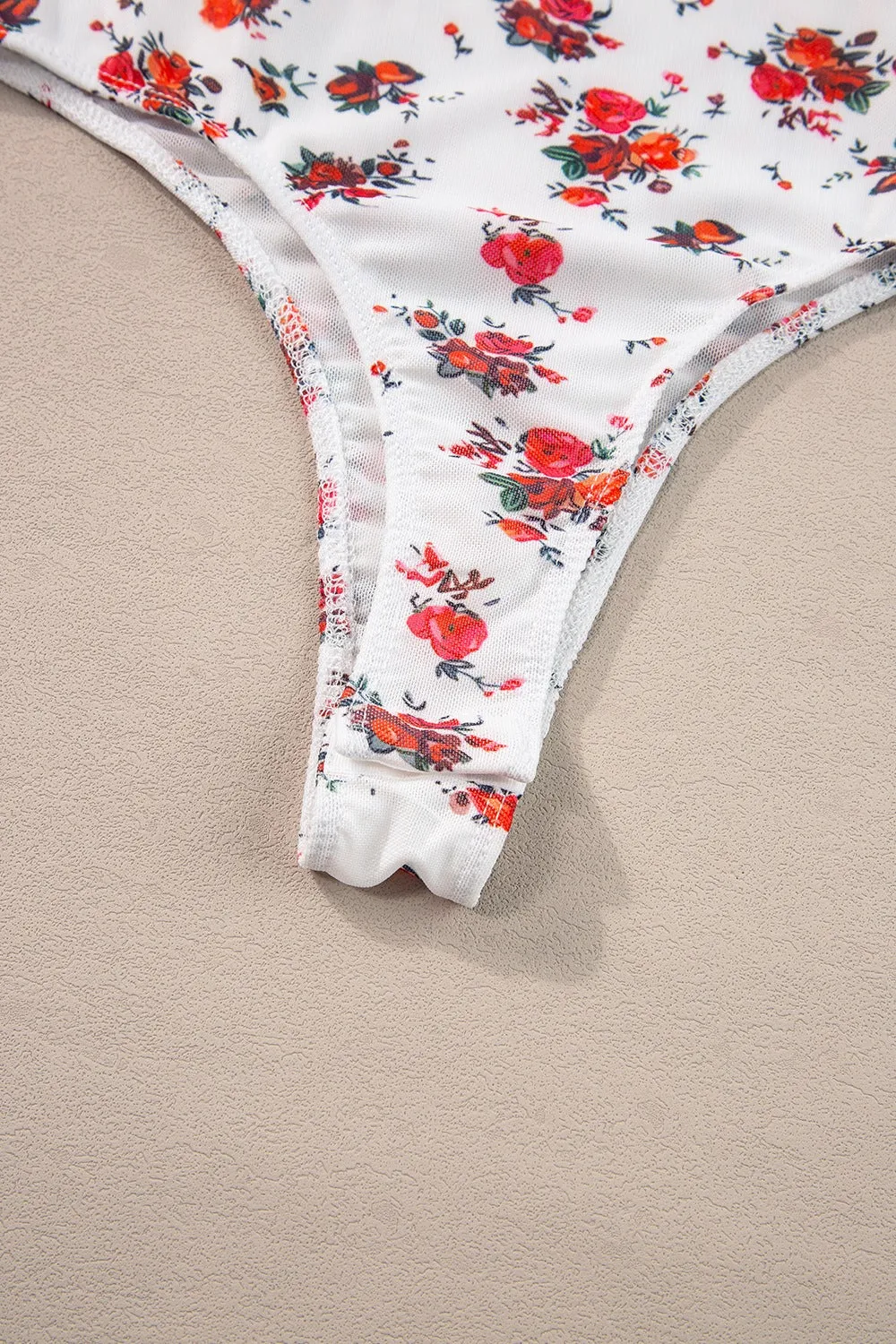 The Foxy Frill Floral Bodysuit