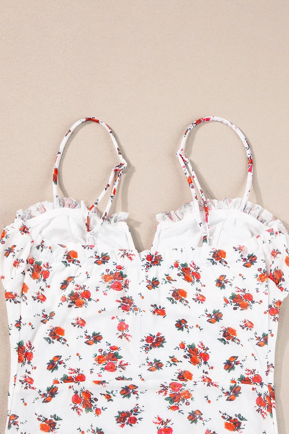 The Foxy Frill Floral Bodysuit