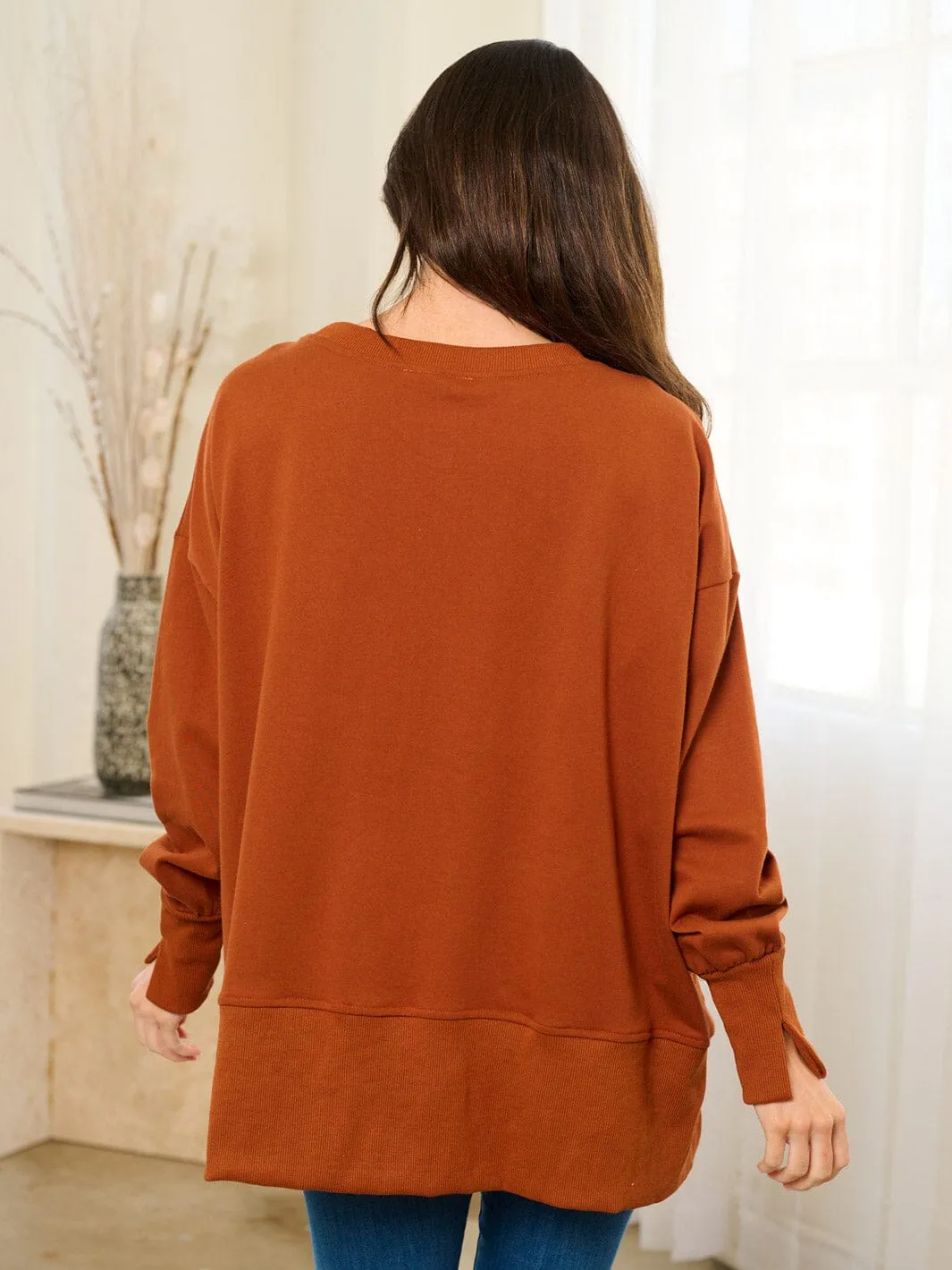 WOMEN'S LONG SLEEVE HIGH-LOW GRAPHIC TOP